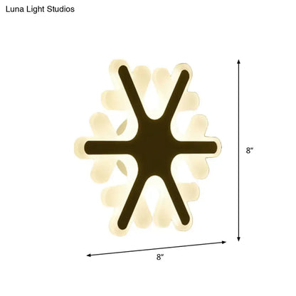 Modern eight-inch square led ceiling light with dark frame and cream glowing petal accents for bedroom use