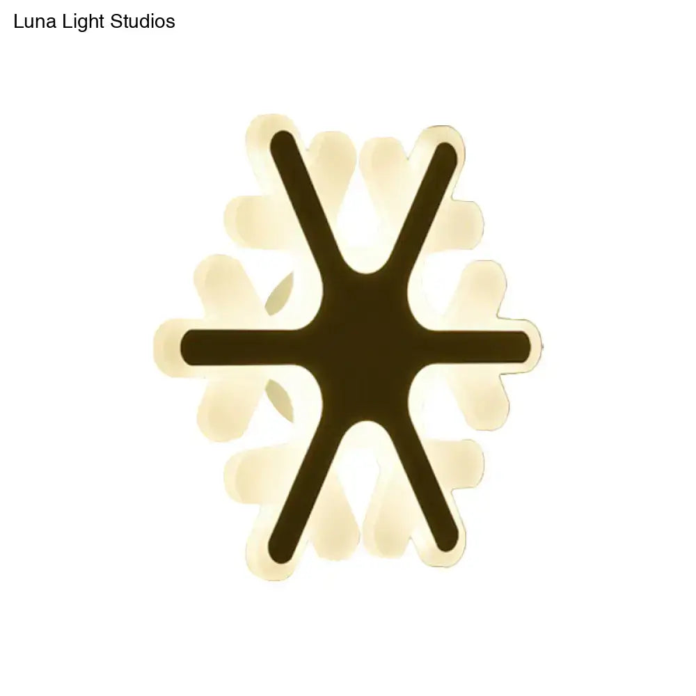 Modern star-shaped cheerful white smiling sun led wall sconce with black frame and glowing translucent white petals for bedroom lighting