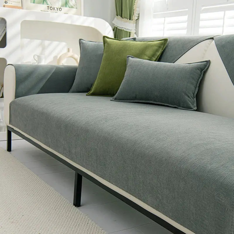 Modern gray chenille textured non-slip sofa cover with herringbone pattern and black white sofa cushions for living room use
