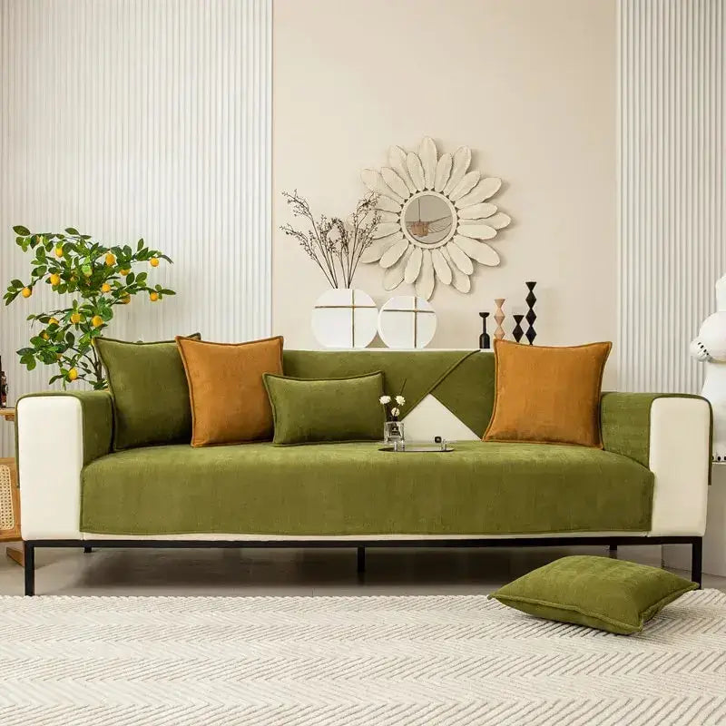 Olive green velvet chenille textured non-slip sofa cover with white armrests and black metal legs for living room sofa cushion