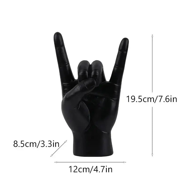 Chic black glossy resin hand gesture sculpture in rock pose for stylish living room decor