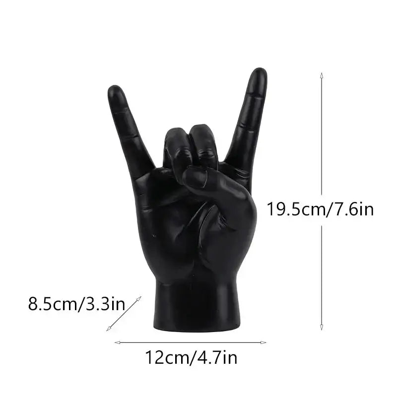 Chic black glossy resin hand gesture sculpture making a rock gesture for living room decor