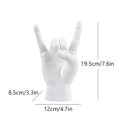 White ceramic hand gesture sculpture making a rock gesture for chic living room decor