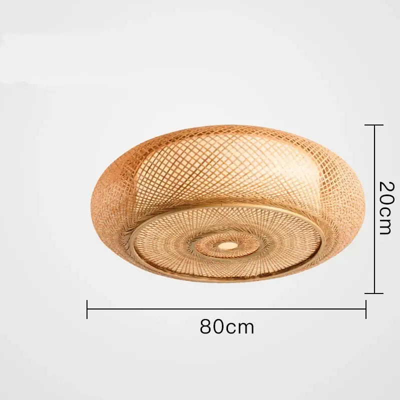 Chinese style bamboo wicker rattan round ceiling light with warm golden hue and intricate lattice pattern for living room