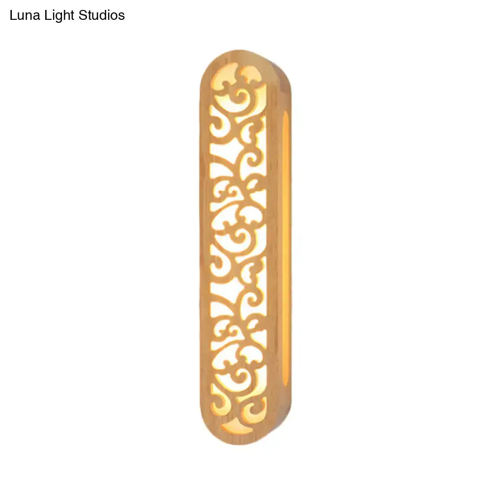 Golden intricately carved wooden wall light fixture with ornate scrollwork for bedroom sconce in chinese style beige tone