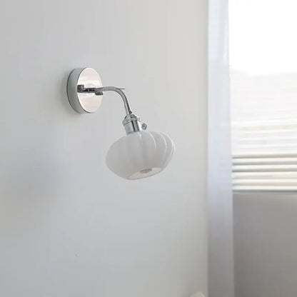 White ceramic wall lamp with a chrome adjustable arm and fluted ribbed glass shade for bedroom decorbites adjustable arm