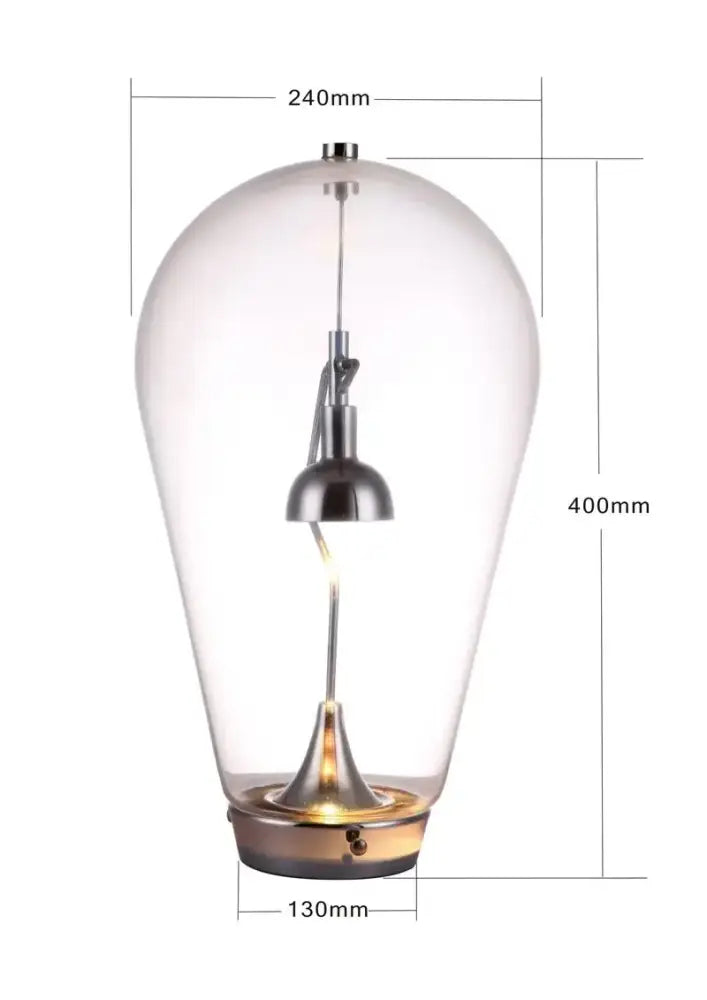 Clear glass pendant led table lamp with sleek metallic finish and teardrop design for modern bedroom lighting
