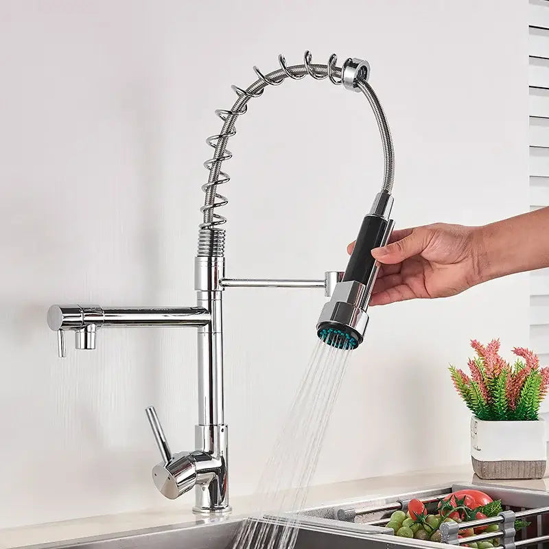 Chrome decorbites kitchen faucet with pull-down spring hose, chrome finish, flexible coiled hose, and black-grip spray head