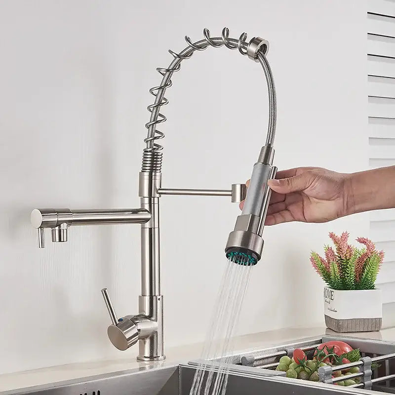 Chrome decorbites kitchen faucet with pull down spring hose featuring stainless steel flexible coiled spray head