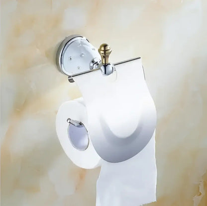 Chrome finished toilet paper holder with decorative gold toned knob and clear acrylic cover in decorbites bathroom hardware set