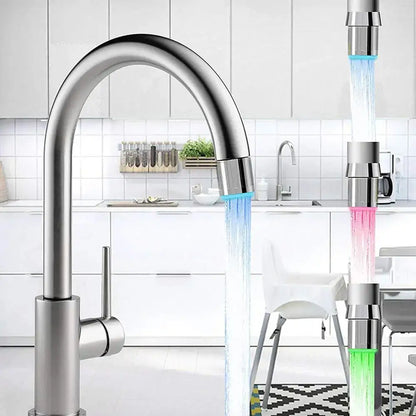 Modern stainless steel chrome led faucet aerator with sleek curved spout and blue illuminated water flow for kitchen use