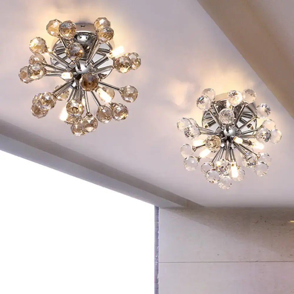 Two chrome sputnik flushmount ceiling lights with radial amber crystal ball design for bedroom illumination