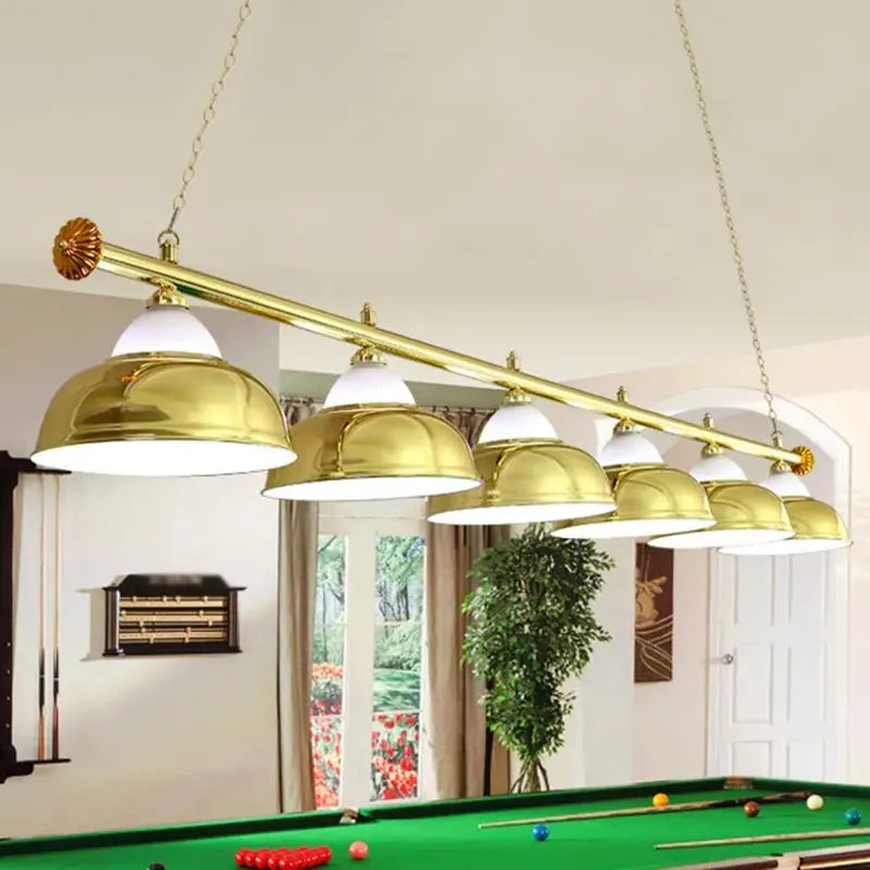 Gold-colored brass steel billiard light fixture with six dome shades and white diffusers for game room ceiling use