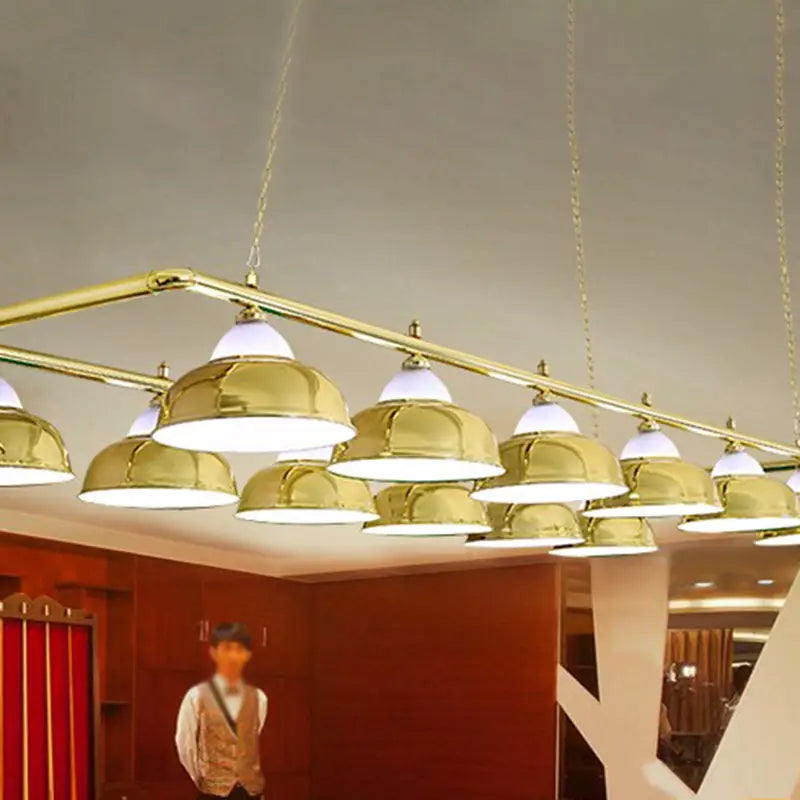 Gold-colored stainless steel billiard pendant lights with white glass shades for stylish game room ceiling decor