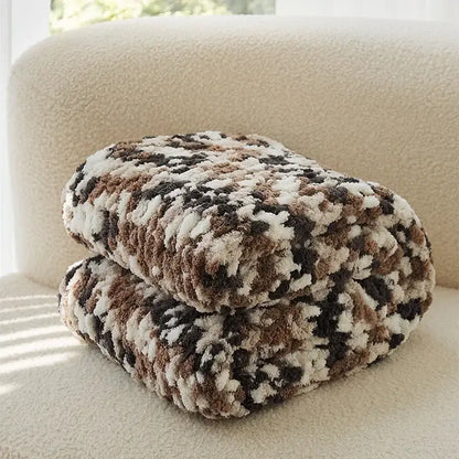 Cozy chunky knit jacquard blanket throw in cream brown and dark gray tones for living room decor