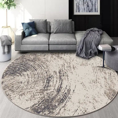 Circular geometric cashmere floor mat with textured abstract pattern in beige and dark gray for living room decorbites