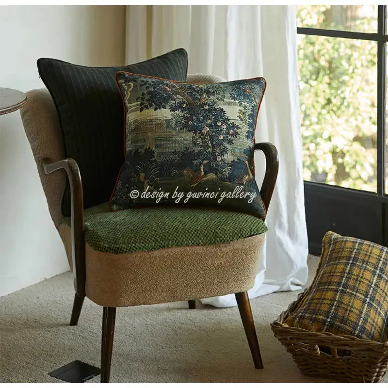 Dark green embroidered pillow cover with detailed landscape scene and gold-toned trim decorbites circular swallows decor