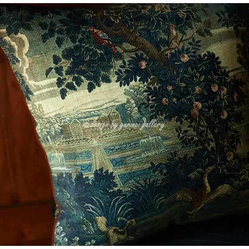 A deep teal decorbites circular swallows pillow cover with intricate woven birds and garden scene for living room decor