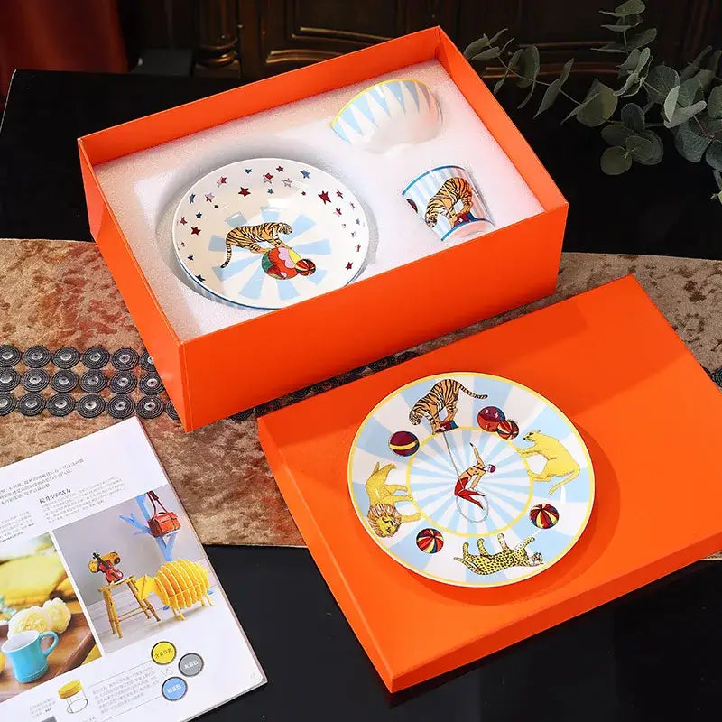 Circus troup kids pink and white ceramic tableware set featuring vibrant tiger and acrobat illustrations by decorbites circus troup
