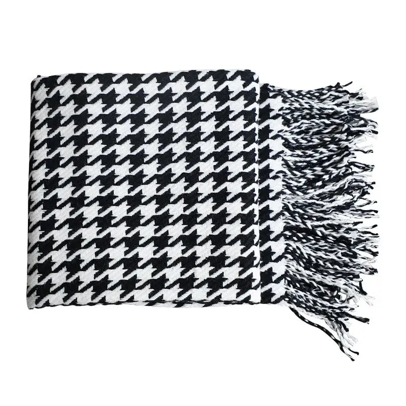 Classic black and white houndstooth throw blanket with fringed ends by decorbites for stylish living room decor