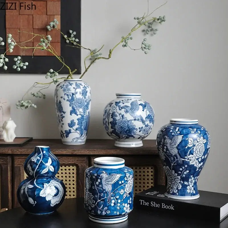 Classic blue porcelain vase with intricate bird and floral designs for living room decor by decorbites blue porcelain