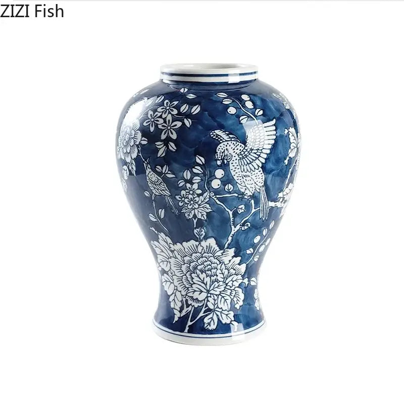 Classic blue porcelain vase by decorbites featuring hand-painted bird and floral designs for living room decor
