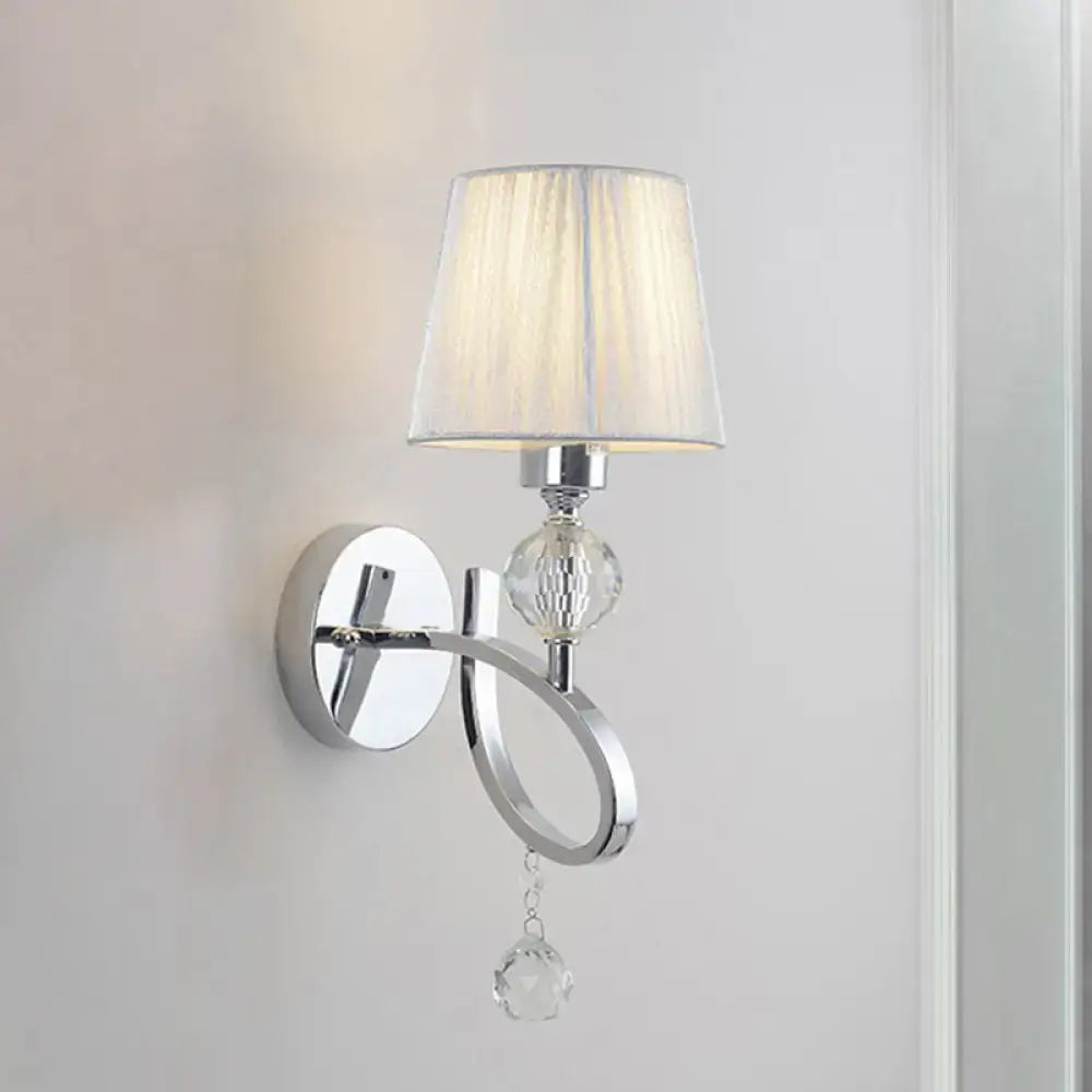 Classic chrome crystal drop wall lamp with faceted crystal accent and off-white pleated lampshade for bedroom