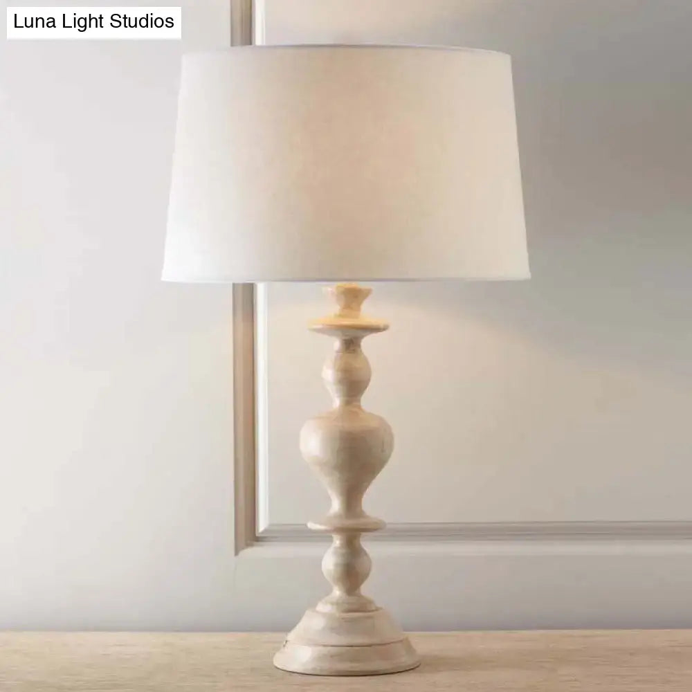 Decorbites white resin base fabric nightstand lamp with distressed wooden base and tapered drum shade for 220v-240v use