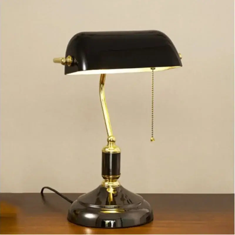 Black patent leather desk lamp with brass accents and curved gooseneck design for decorbites glass lampshade bank