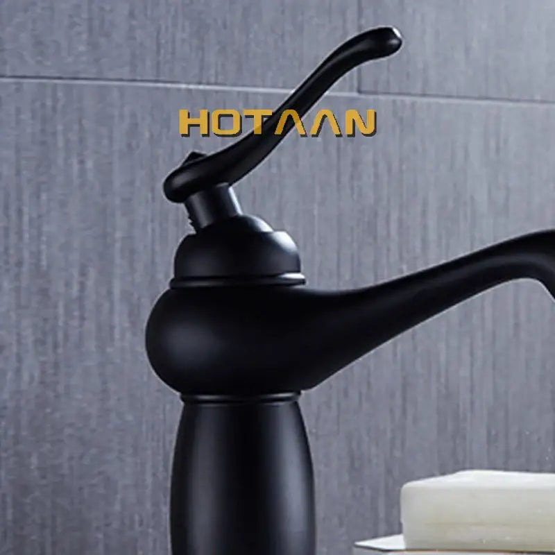 Classic matte black brass basin faucet with curved spout mixer in black brass bathroom decorbites design