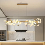 Gold-toned leaf pendant lamp with delicate metalwork and frosted glass accents from decorbites classic white collection