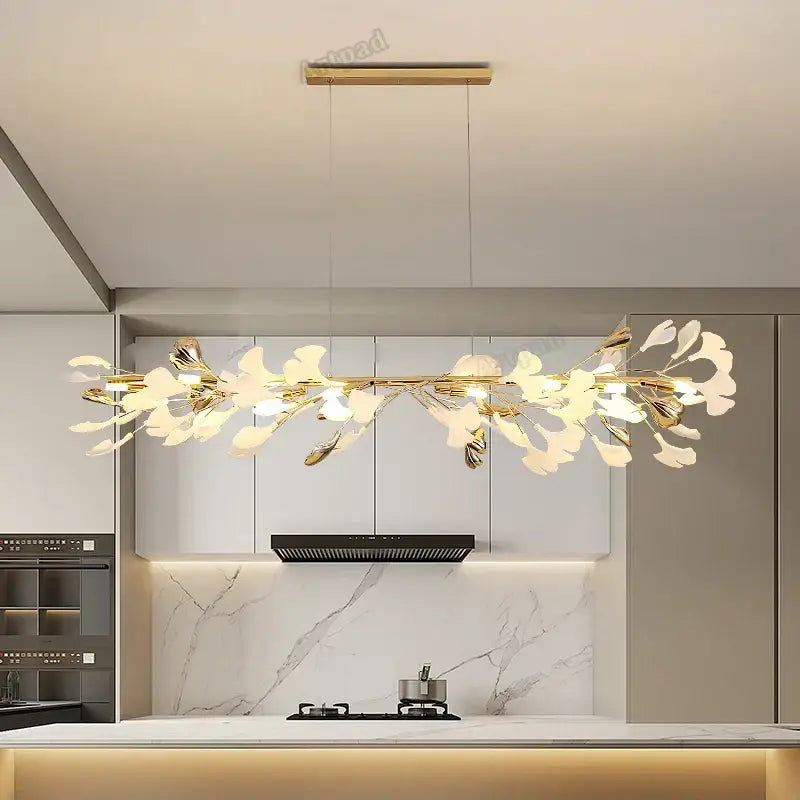 Gold-toned leaf pendant lamp with delicate metalwork and frosted glass accents from decorbites classic white collection