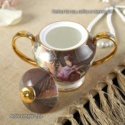 Porcelain sugar bowl with gold-trimmed handles and vintage woman painting in