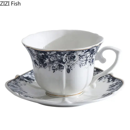 Elegant white ceramic cup and saucer set with grey blue rose floral pattern and gold trim for dining room use