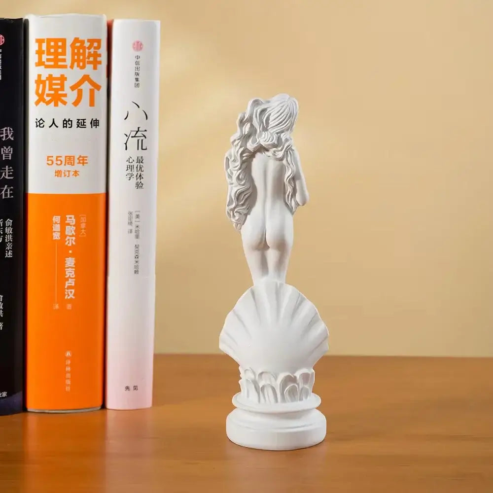 Classical white resin 18cm aphrodite sculpture of a nude greek goddess on an ornate seashell base for living room decor