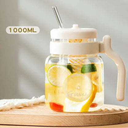Clear 1000ml glass tumbler with handle and straw filled with lemon-infused water for kitchen use decorbites 1000ml glass
