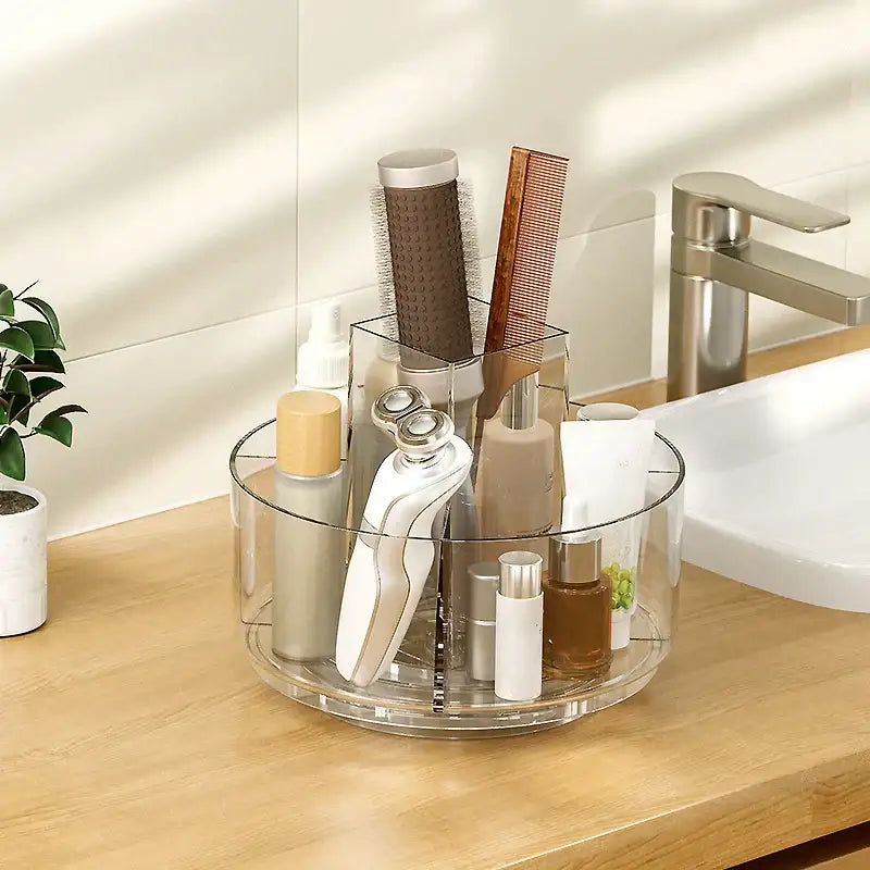 Clear 3 tier rotating acrylic makeup organizer in clear acrylic with multiple compartments for grooming storage