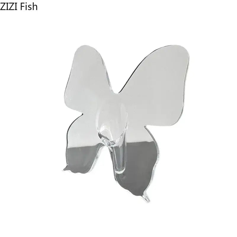 Clear acrylic butterfly vase featuring a transparent butterfly-shaped adhesive hook for decorbites butterfly vase display