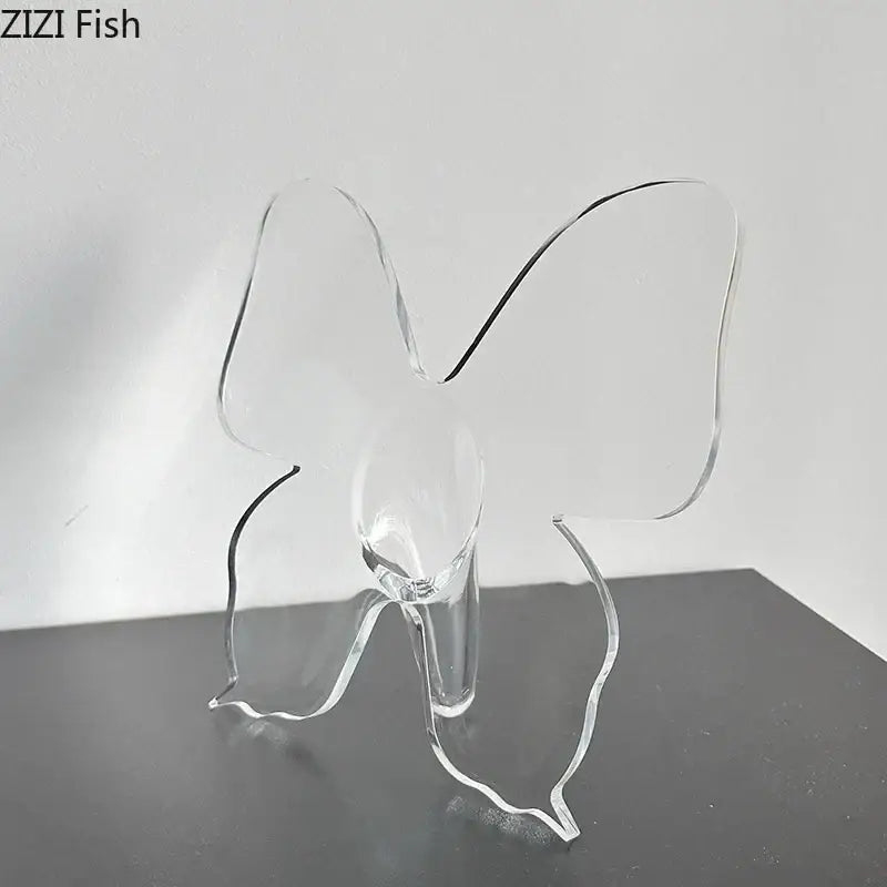 Clear acrylic butterfly vase by decorbites with smooth transparent wings and sleek base for bedroom flower arrangement