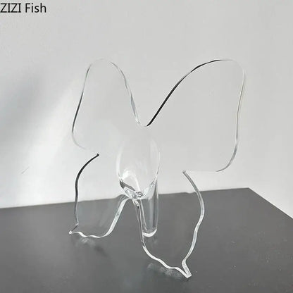 Clear acrylic butterfly vase by decorbites with smooth transparent wings and sleek base for bedroom flower arrangement