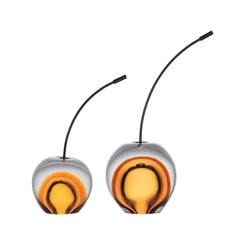 Clear and gold crystal cherry sculpture with translucent glass cherries featuring orange and yellow swirls for living room decor