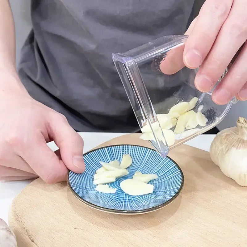 Clear plastic and gray decorbites garlic grinding grater cutter with rectangular tapered design for kitchen use