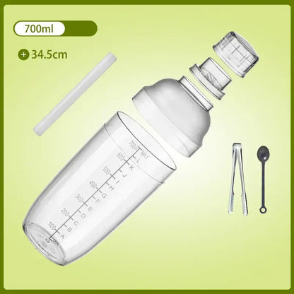 Clear plastic cocktail shaker 700ml with graduated markings silver lid and included straw tongs and spoon for beverage mixer