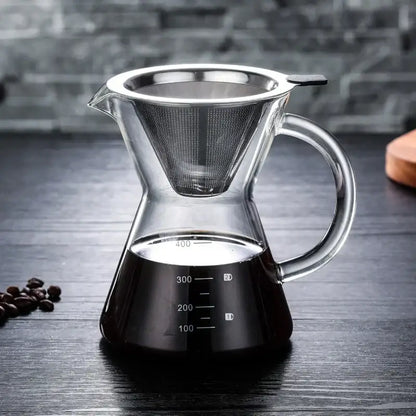 Clear glass coffee pot with stainless steel filter and measurement markings on the base for precise brewing
