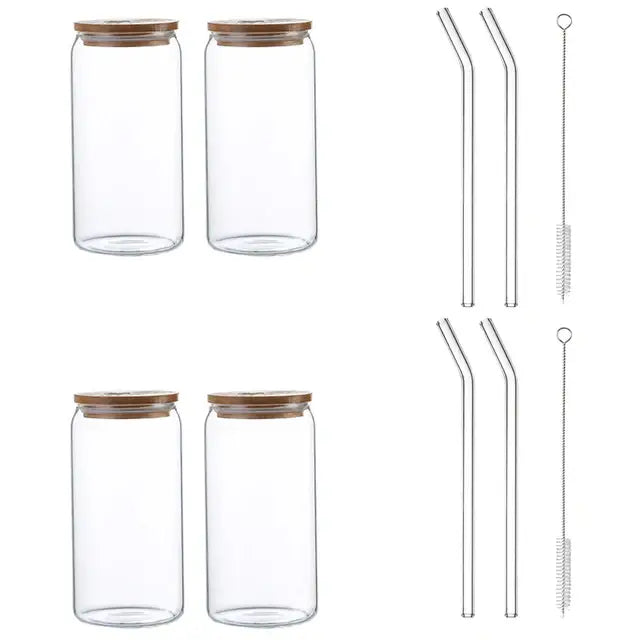 Set of four clear glass drink cups with bamboo lids and matching glass straws by decorbites for kitchen soda use