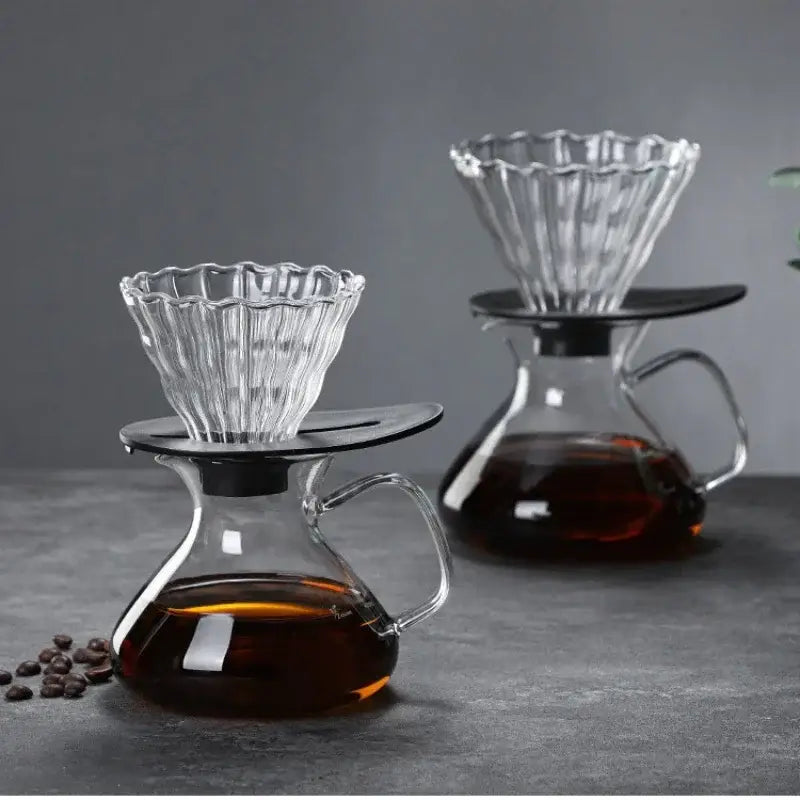 Clear glass drip pot coffee set with fluted glass dripper and black plastic base for drip pot coffee brewing