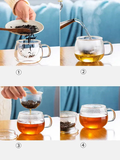Clear glass floral tea cup with double-walled design, handle, filter, and matching lid for kitchen teaware use
