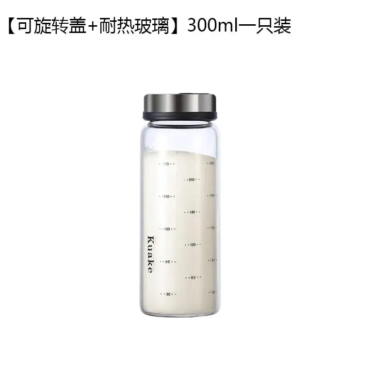 Clear glass spice shaker with rotary silver lid and measurement markings by kuake for salt sesame pepper storage