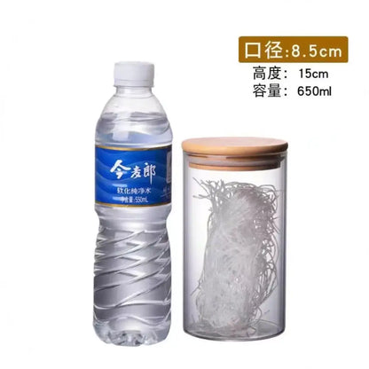 Clear glass storage jar with bamboo lid containing white noodles for kitchen organization and storage jars use