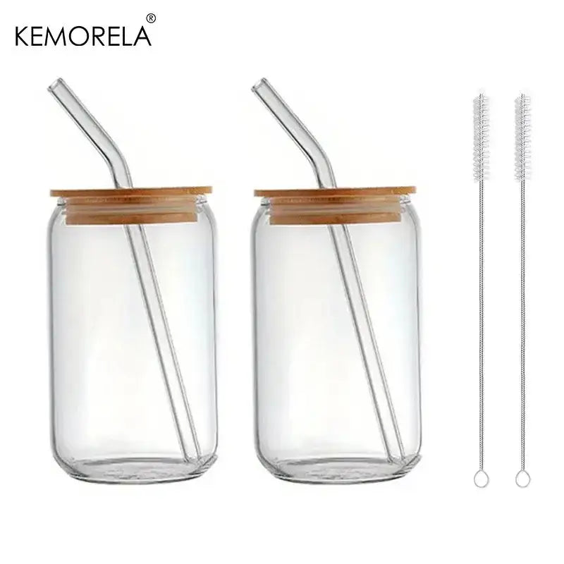 Clear glass tumbler cups with bamboo lids and curved straws branded kemorela for reusable drink use